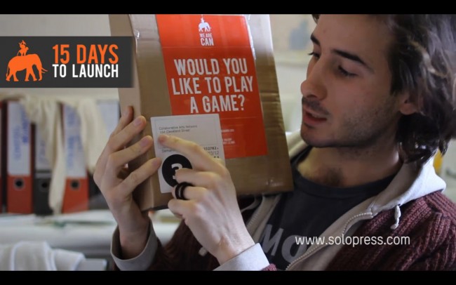 We Are CAN founder Damiano Marchetti opens printing package from Solopress