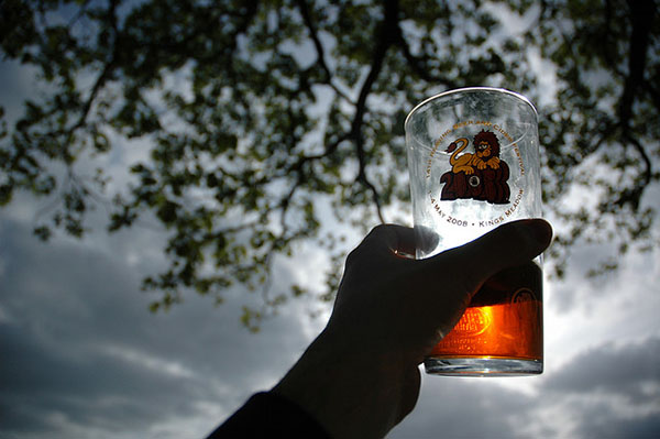 Photograph of a man holding an almost empty pint of beer from Reading Beer Festival