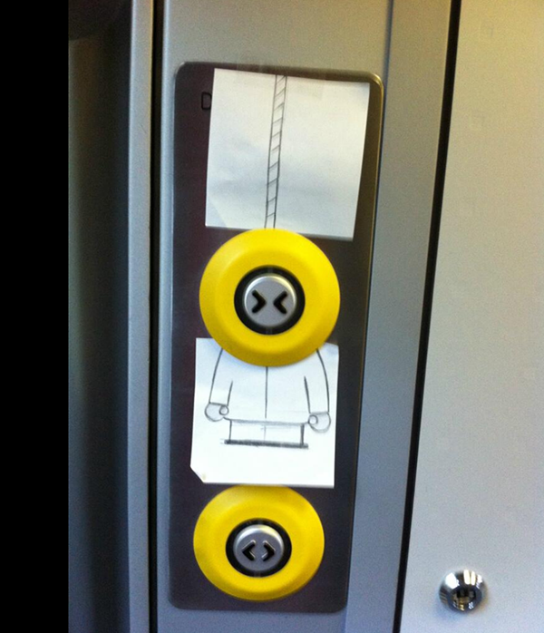 Funny drawing of Kenny from South Park appearing to 'hang' from a train carriage door button