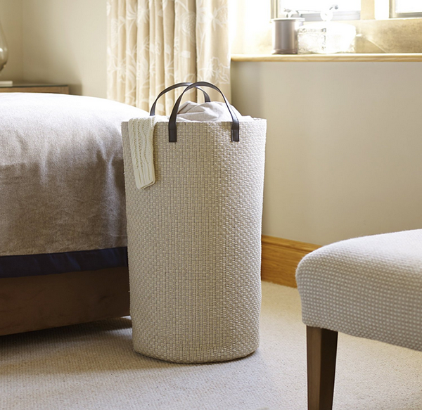 Photo of a contemporary and useful linen basket wedding gift idea