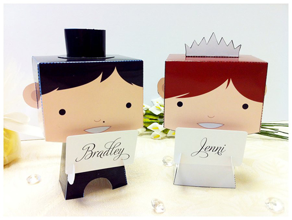 Cute paper craft bride and groom figures to go on top of a cake.