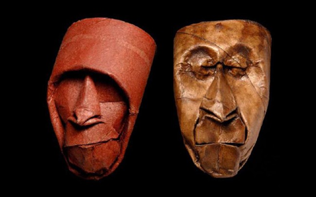Pair of painted paper masks