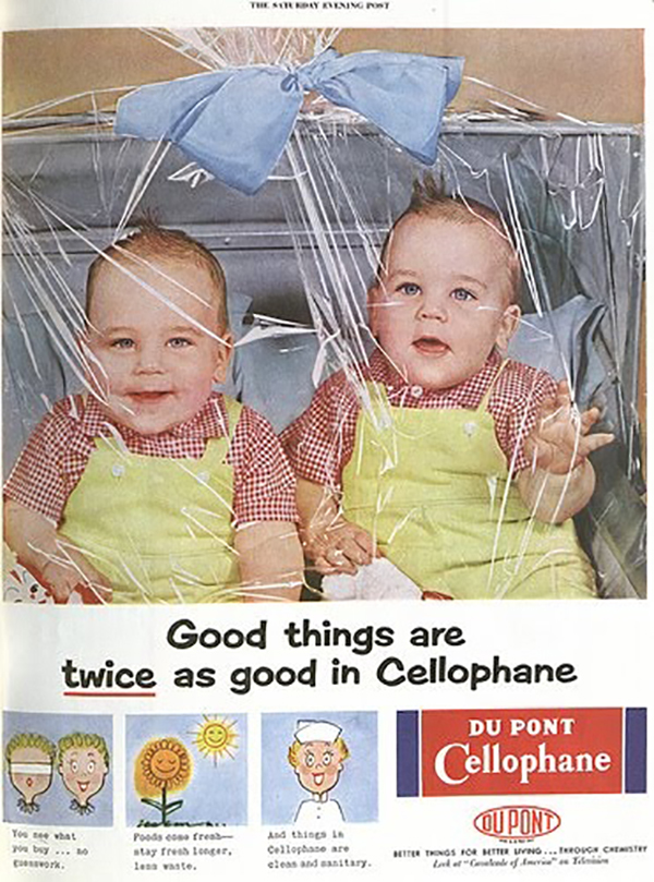Two babies sit wrapped up in cellophane like a present with the caption, 'good things are twice as good in cellophane'