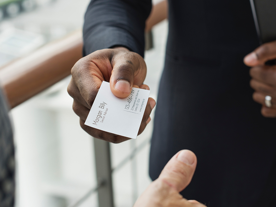 Person Offering Business Card